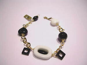 yzWG[EANZT[ AWFgAK^rAJGIj`Flbracciale in argento agata bianca e onice nero