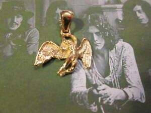 yzWG[EANZT[ bhcFbyAWFSVIhIWbvhbgAeBW[mled zeppelin angelo logo ciondolo oro giallo 18 kt prodotto artigiano