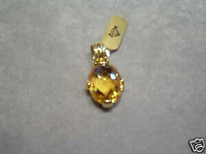 yzWG[EANZT[ IWbgp[cBIWbVIhciondolo in oro giallo 18kt e topazio giallo