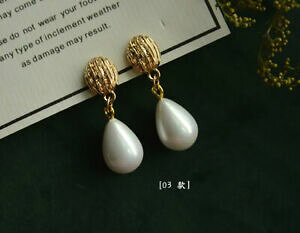 yzWG[EANZT[ p[zCghbvNXgS[fCONbvboucles doreilles clip on dore pendant perle goutte blanc poire class retro j11