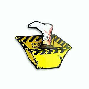 yzWG[EANZT[ Ebh`bp[Giys{uOANVcreepy co woodchipper enamel lapel pin with bobbling severed leg action