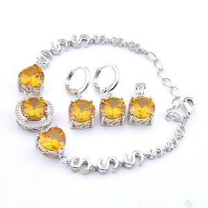 yzWG[EANZT[ EhJbgS[WXVCj[S[hVgWFVo[uXbgCOZbground cut gorgeous shiny gold citrine gems silver bracelet pend