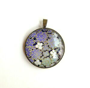 yzWG[EANZT[ ^[RCYp^[y_gpendentif, au motif de fleurs en degrade de turquoise a violet sur fond noir