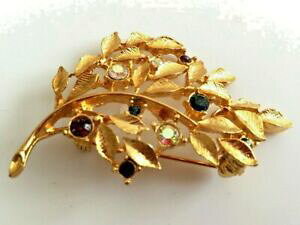 yzWG[EANZT[ AmCNX^S[h[tu[`tres belle broche feuille dore crystal multicolore signe lia neuve
