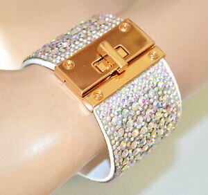 【送料無料】ジュエリー・アクセサリー ブラッチャレビアンコボレレオロドンポルシエラストラストリングスクリスタルリファシアリジドbracciale bianco boreale oro donna polsiera strass cristalli fascia r