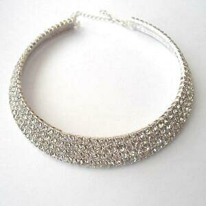 yzWG[EANZT[ R[iR[mejXW_J[AWFgRt@CfBWRjrALcollana collarino tennis rigida colore argento con 4 file di zirconi bianchi 39