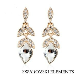 yzWG[EANZT[ XtXL[COhbvRboucles doreille feuilles longue goutte deau transparente swarovskiR elements
