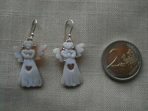 yzWG[EANZT[ AWFgIbL[jJIThjRAWFXtBIJeB^eBorecchini cammeo sardonico angeli sfioccati montati in argento 925