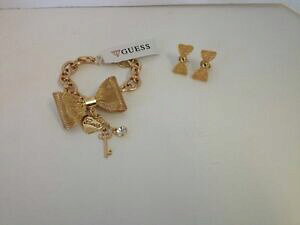 yzWG[EANZT[ S[hbVCO{EuXbgL[n[gZbgnuovo guess set di due color oro rete orecchini fiocco bracciale, key, cuore ,