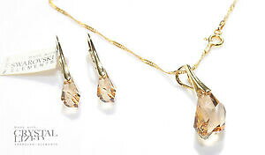 yzWG[EANZT[ XtXL[RGcS[fVhEhbvy_g|SCOZbgregalo boxed swarovski R elements golden shadow ciondolo goccia poligono a