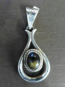 yzWG[EANZT[ Be[WVo[^CK[ACy_gmolto bel ciondolo occhio di tigre autentico su argento vintage 1970