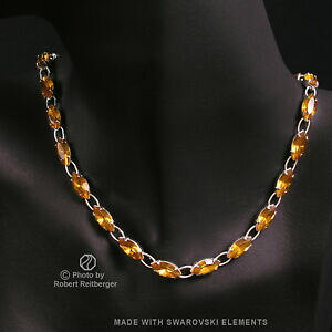 yzWG[EANZT[ gp[Y}[XtXL[NX^`F[Vgnavette catena con cristallo swarovski in topaz marrone