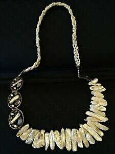 yzWG[EANZT[ }U[Iup[TSJbglbNXfavolosa collana in madreperla taglio corallo asimmetrica