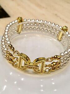 yzWG[EANZT[ XtXL[p[WRobNXbhEFfBOuXbgbracciale da sposa realizzati con tre fili swarovski perlezirconi fibbia