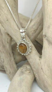 yzWG[EANZT[ ^CK[ACVo[y_glbNXcollana con ciondolo in argento con occhio di tigre