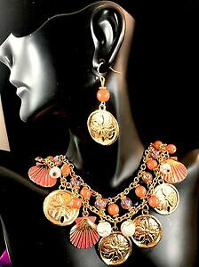 yzWG[EANZT[ Lh[O[YS[fR[p[RCJo[lbNXuXbgCOcarol dauplaise dorato corallo perlina moneta cover collana bracciale