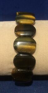 yzWG[EANZT[ ^CK[ACuXbgbracciale occhio di tigre elastico