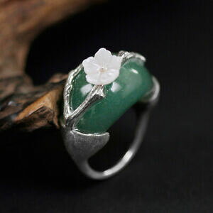 yzWG[EANZT[ S[hVFt[j[NOanello unico con gemme in argento 925 con fiore di conchiglia in oro 18k