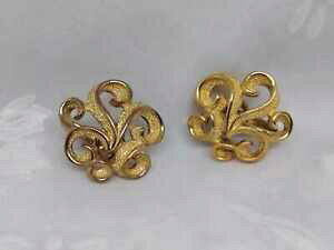 yzWG[EANZT[ lAo[J[COorecchini firmati monet color ambra