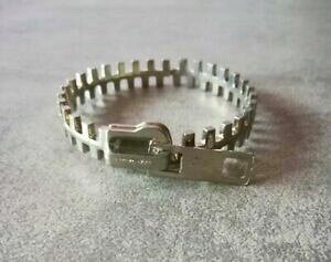 �y���������z�W���G���[�E�A�N�Z�T���[ �W�b�p�[�u���X���b�gbracciale a forma di cerniera