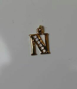 yzWG[EANZT[ yfeBtCjXeVvgGAvPZeBhXgXCfJh[pendentif initiale simple lettre n en plaque or serti de strass idee cadeaux