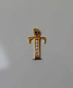 yzWG[EANZT[ yfeBtCjXeVvgeAvPZeBhXgXCfJh[pendentif initiale simple lettre t en plaque or serti de strass idee cadeaux