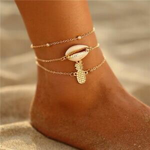 yzWG[EANZT[ `FBhAxbNRLA[WJEGubNpCibve3 chaines de cheville dorees avec coquillage cauri et breloque ananas ete 2020