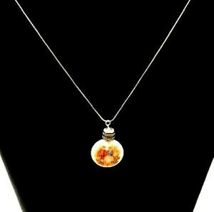 yzWG[EANZT[ yfeBt~j`Ahpt@VFCvgIptSi[V`F[pendentif miniature de parfum forme montre opaline decor fragonard sur c