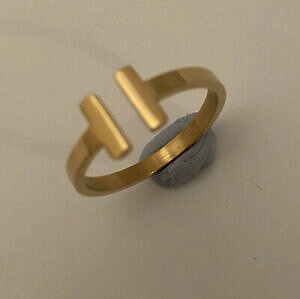 yzWG[EANZT[ S[hg[_uJtCI[vo[XeXX`[OTCYgold tone double t linee polsino open bar anello in acciaio inox taglia 8o nuovi donna