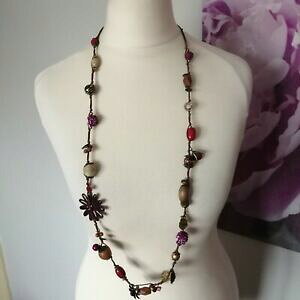 yzWG[EANZT[ g{w~AuE[v}`J[r[Y~bNXt[EhOlbNXretro bohemien marrone corda multi colore con perline fiori misti col