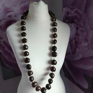 yzWG[EANZT[ gn[gvX`bNuEeNX`S[hr[Y{[XlbNXdichiarazione retro cuore in plastica marrone trama grossa con perline oro nastro c