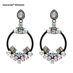 yzWG[EANZT[ u[NhCNI[XtXL[RGcVZ~Nm[boucles doreilles creoles swarovskiR elements sur ceramique noir