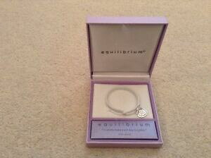 yzWG[EANZT[ bLthVbvuXbgoCC{bNXsilver plated friendship bracelet by equilibrium in box