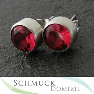 yzWG[EANZT[ mXeXRNVt@NVAWR{^COmelano collezione in acciaio inoxorecchini a bottone con zirconi fuxia