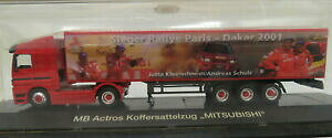 【送料無料】模型車 モデルカー シューコアクトロススーツケースパリダカールschuco mb actros suitcase articulated mitsubishi winner parisdakar 2001 187