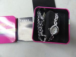 yzwatch womens by time100 real nice with bracelet in pink tin box