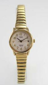 【送料無料】timex watch womens stainless gold stretch date light 30m water res beige quartz