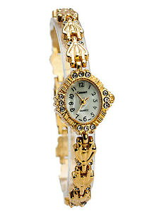 �y���������zcassantwomens gold finish rhinestones oval case links analoge watch
