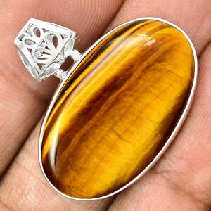 yzlbNX@^CK[ACgbv}Egpendentif oeil de tigre monture argent 925 top protection ref 7376