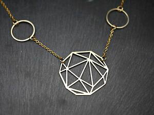 yzlbNX@J[O`[gS[fT[Ncollier avec anneaux et cercle motif graphique moderne dor