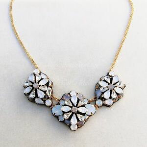 yzlbNX@R`Fg[fBcollana tono oro con centrale di strass opalini e trasparenti