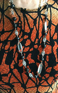 yzlbNX@NbvZ~bNXlong collier bicolore translucide et noir ceramique quartz aiguille annees 60