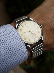 yzrv@EHb`@Be[WuU\XCX~tXnuevo anunciomontre elge 1960 vintage besancon swiss made big eyes 37 mm mecanique french old