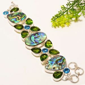 yzuXbg@ANZT?@ArVFyhbgVo[WG[uXbgabalone shell, peridot gemstone silver jewelry bracelet 78 nrb1606
