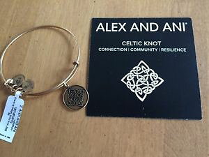 yzuXbg@ANZT?@AbNXZeBbN^OJ[hS[hg[alex and ani celtic knot with tag and card gold tone
