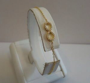 yzuXbg@ANZT?@CG[S[hX^[OVo[uXbgANZgC`14k yellow gold over 925 sterling silver infinity bracelet w accents 7 inch