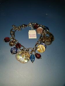 yzuXbg@ANZT?@ArwKXrv62CA\tBAwindsonglia sophia neptunewindsong genuine abalone wglass beads charm bracelet rv62