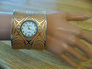 �y���������z�u���X���b�g�@�A�N�Z�T��?�@���C�h�t�@�b�V�����J�t�u���X���b�g�I�����W�S�[���h�A�X�e�J�T���f�U�C���E�H�b�`big bold wide fashion cuff bracelet watch orange gold aztec sun design nwot