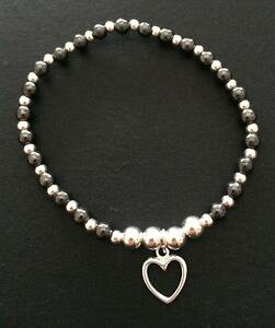 yzuXbg@ANZT?@X^[OVo[w}^Cgr[YVo[n[g`[Xgb`uXbgsterling silver and hematite beaded stretch bracelet with silver heart charm