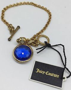�y���������z�u���X���b�g�@�A�N�Z�T��?�@�N�`���[���u���X���b�g�g�O�� juicy couture gold tone chain blue gem skull charm bracelet toggle clasp